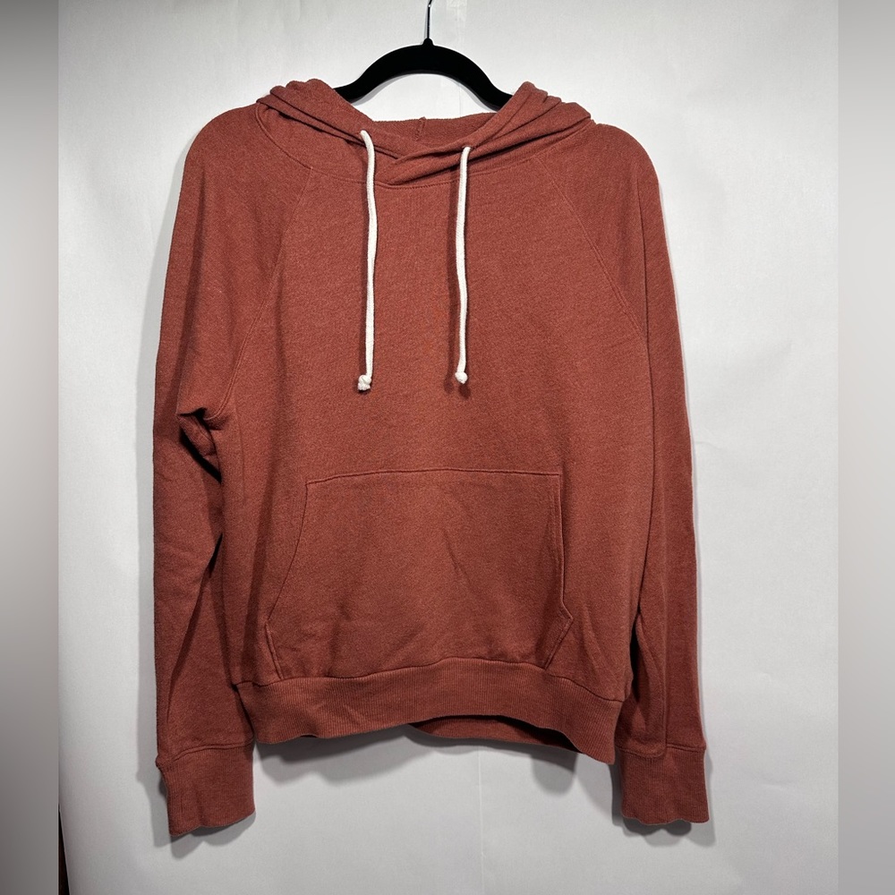 Burnt orange hooded sweatshirt, size M